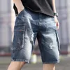 Zomerheren grijs geperforeerde denim shorts Koreaanse mode slanke elastische vijfstuk jeans mannelijke merkbroek 11styles 240422