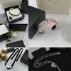 Nieuwste mode-look ketting Hotverkopende driehoekige hangende oorbellen Designer Gold Bracelet sieraden Sierketen voor jongens mannen vrouwen sieraden geschenk