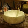 Dekorativa figurer Fregadero de Bano Con Diseno Marmol Redondo Europeo Lavabo Artistico Ceramica Sobre Encimera Cuencos Para Champu