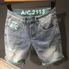 Summer Mens Fashion lavé à cinq points Shorts en denim Label de mode américain Stratted Breathable Shorts Jeans 240430