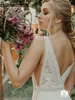 Boheemian Deep V-Neck Open Back Wedding Jurken A-Line Mouwloze Appliques Lace Pleat Country Bridal Jurk