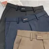 Herenpakken merkkleding gestreepte mode zakelijke pak broek mannelijke streep slank fit casual broek 36-28