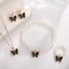 Juego de joyas de mariposa de perlas transfronterizas goteando mariposa pulsera de perlas aretes collar accesorios de niñas estilo casual