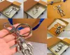 Designer Spaceman Key Ring letra de alta qualidade Acessórios de cadeia de chaves metal unissex prateado abridor de garrafas robôs carros pendentes K8148818
