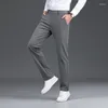 Erkek pantolon moda gevşek bir eklenmiş cepler fermuarlı düz renk rahat 2024 İlkbahar ve yaz büyük boy all-maç Korece