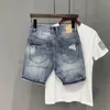 Mens d'été personnalisés personnalisés shorts de jean grattés en denim slim fit coréen Capris Capris Men Hole Jeans Shorts 240430