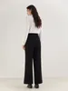 Pantalon féminin Dushu décontracté polyvalent le-jumelle mince cloche avec design de printemps pour les femmes couvrantes de chair pantalon noir