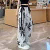 Pantalon pour femmes pantalon de style chinois à la chinois encre bambou imprime en mousseline avec décoration de streamer