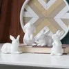 1pcs Pâques Hare Blanc Rabbit Figurines Figurines Porcelaine Gift Modern Nordic Animal Statue for Landscape Decor 240425