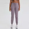 Lange broek voor dames Capris Classic Jogging Drawtring Losse yoga pocket zweetwikkelende fitnessdanssporten Runnen Runstig zacht zacht