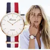 Polshorloges Classic Fashion Stripe Nylon Band Women Top Luxurymerk Men Quartz Pols Pols Lady Montre Femme Horloge Saat Saatklok D240430