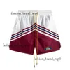 MANNEN BEHADBAAR STRAND MANNEN CASUAL RHUDE KORT MESH TRAIN BEHADBAAR ONDERZEGEN SHORTS TADE STRAPTRING SHORTSEN Gratis Rhude -verzending voor zwart -witte shorts 5727