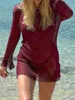 Femmes plage Wemen Bikini Cover-up Sexy dames See-Through à manches longues Backless Beach Knitted Mini Robe Swimwaies Suncreen Robes D240501