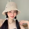 Brede rand hoeden Koreaanse zomer grote dakrand veter straw hoed dames massieve kleur literaire en zoete veelzijdige buitenste zonnescherm opvouwbare zonnedop