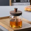 Garrafas de armazenamento garrafa de mel com haste de madeira bom gente de vedação jarra de vidro bastão bastão de gotas de comida segura para cartuchos para