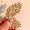 Brosches Luxury Quality Aosterrian Crystal Feather Brosch Premium Coat Wing Corsage Copper Inlagd Zircon Gemstone Pins For Women Suits