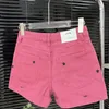 Designer jeans femminile primavera/estate alto alto rosa ricamo nero ricamo nero personalizzato pantaloncini di denim rosa rosa per donne