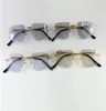 Colori di lente con occhiali da sole buff cambiati nel sole da cristallo a scuro design diamante telaio senza bordo esterno 02819 con B9555417