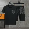 Luxo novo designer masculino de pilotos de rastreamento de jogger moletons esportivos mano esportivo masculino Mulheres de manga curta Designs de pulôver de suor Sportswear camisa 523179