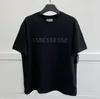 Summer Men's Designer Fashion Fashion Camiseta Camiseta de letra negra de letra negra Un par de camisetas de mujeres sueltas para hombres