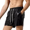 Mäns shorts herrar våt utseende shinny glansiga stammar sport bodybuilding strand fitness gym kort byxor avslappnad ljus läder