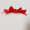 Hundekleidung 1PCS Taktische maltesische Haustier Bogen Kopfschmuck Blumenbandmodelle importiertes Luftpony