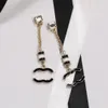Brincos clássicos da marca de luxo Brincos preto e branco Cilindro de esmalte duplo Chain Fringe Never Fade Fade Brass Jewelry Gift