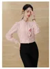 Blouses pour femmes à manches longues à manches longues Festival de tempérament Stripe Ruffled Couffle pour le printemps Pink Office Button Slim Tops Fashion