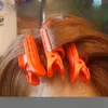 Nieuwe professionele haarwortelsrollen Clips Natuurlijk donzig Haar krultje Twist Wave Fluffy Plastic Hair Styling Tools voor haarstyling