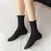 Donne calzini 5 paia di donne arruffate di colore nero a colori solidi comfort di cotone traspirato di cotone mid-tube