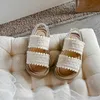 Sandals Girls Beach Chaussures tissées Roman 2024 Été Nouveau sangle de dos pour bébé à semelle douce 23-37 H240504