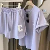 Kvinnors spårningsdräkter 2 st/set casual sports kostymer kvinnor sommar kort t-shirt toppar breda ben shorts mode två styck uppsättningar kvinnor klädsport