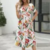 Casual Dresses Women Summer Elegant Fashion Flower Printed Round Neck Kort ärmklänning med fickor Daglig vanlig all-match