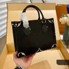 Designer le sac fourre-tout Femme sac à main les mini bacs bacs noir crossbody shopping sacs de mode de luxe petite lettre de fleurs créatrice