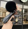 Классика Bear Bearchain Женщины Pompom Pomlush Car Ключ декоративные подвесные аксессуары Высококачественные сетки из трех частей.