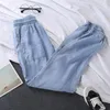 Jeans femminile primaverili sciolti di pantaloni harem per i piedi in piedi pantaloni in vita oversize oversize raffreddamento da donna in denim autunno di denim femmina