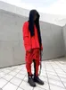 Мужские брюки асимметричная восковая поверхность выдолбленная бегуна грузовая уличная одежда хип -хоп хлопок красные повседневные брюки Мужчины