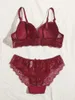 Bras stelt Viomisha sexy lingerie set dame push omhoog transparante bloemenbuiging intieme mooie kanten ondergoed panty