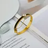 Braccialetti in acciaio Banglenewstyle Women Bangle Gioielli designer di lusso 18K Gold inossidabile in acciaio inossidabile Amanti per matrimoni Gift Bangles Accessori all'ingrosso