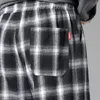 Pantalon à plaid pour hommes Coton Coton Casual Losse Hip Hop Baggy Sweatwear Fashion Streetwear Korean Style Harem 240429