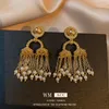 Brincos de balanço imitação de greve de vento Pearl Tassel Korean Fashion Jewelry Design Exagerado por muito tempo para mulheres