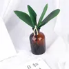 Dekorative Blumen 1 PCs PU künstliche grüne Schmetterling Orchideen Blätter Plastikblume Home Hochzeitsfeier Dekoration