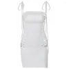 Röcke sexy weißes Mini Kurzes Kleid für Frauen Sommer Camisole ärmellose Rückenless Hohlkleider Solides Nachtclub -Outfit