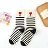 Vrouwelijke sokken lente en herfst katoen dames modieuze middenbuis houden van een woord solide kleur gestreepte eenvoudige kousen