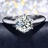 1ct Moissanite Classical Six Claw Wedding Rings 럭셔리 보석 925 스털링 실버 라운드 컷 CZ 다이아몬드 보석 파티 여성 솔리테어 약혼 밴드 반지 선물