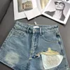 pantalones cortos para mujeres jeans shorts para mujer ropa miui verano nueva industria pesada letra diéprula el diseño de bolsillo decorado pantalones cortos de mezclilla premium lavados