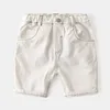 Shorts pour enfants cinquième pantalon garçons Summer Capris Baby Brass Buckle Ligne Fashion Couleur solide Génération de cheveux