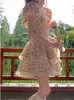 Robes de fête imprimées fleur kawaii robe douce femme creux de français vintage mini designer coréen de papillon femelle 2024
