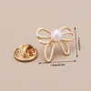 Broches Fashion Butterfly Pin pour femmes Bowknot Shape Badge Metal Badge Femelle Anti-Glare Fixed Clip Clothing Accessoires