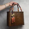 Bolso de paja de mujer tejida a mano Bambú de bambú de ratán bolsos de mimbre de verano bolsos de mimbre de té retro artesanías 240430